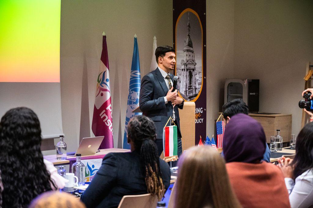 Speaker addressing the international forum audience
