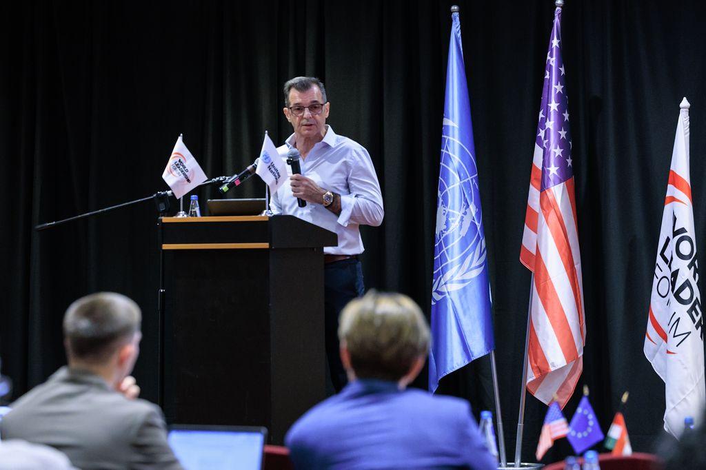 Plenary speaker at the World Leadership Forum podium